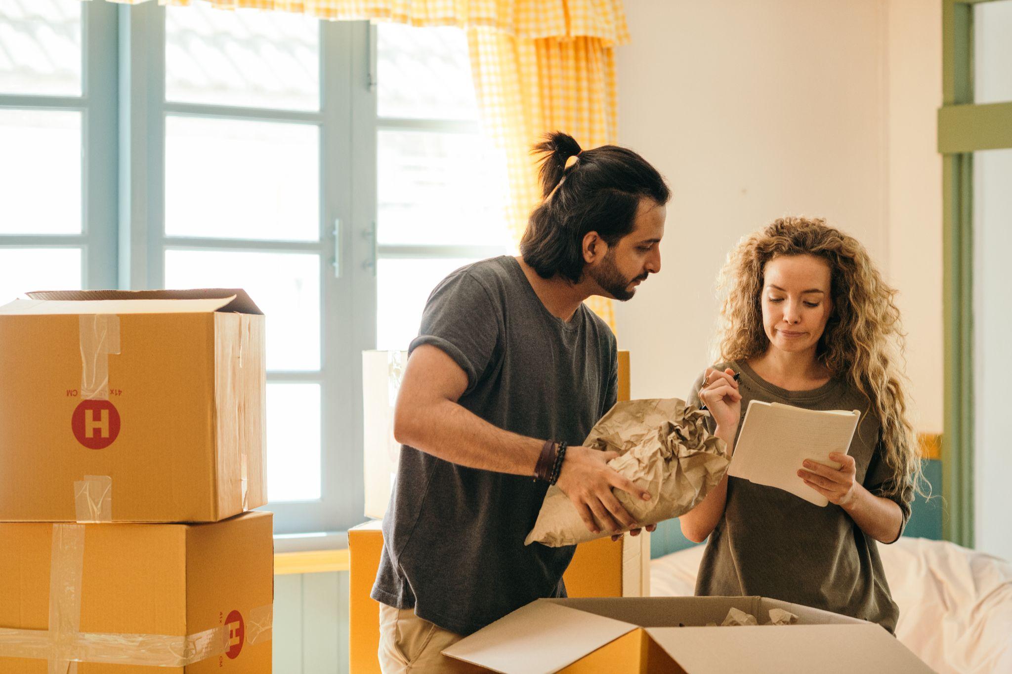 Couple packing home for a move